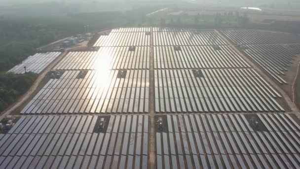 Footage B roll of Aerial drone view looking downwards into large solar panels at a solar farm. Solar cell power plants. Green Energy sun power. footage video 4k. - Footage, Video