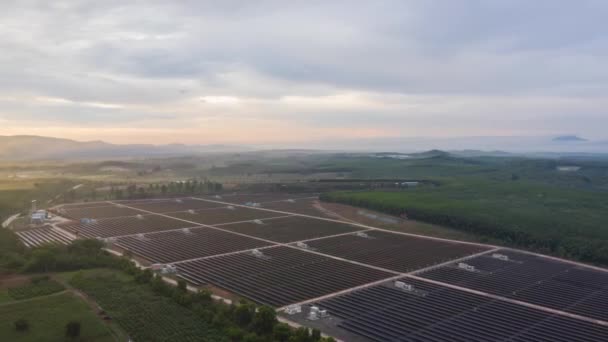 Aerial view of Hyperlapse Time lapse Solar cell farm, Solar power plants have clouds moving through and sunlight shines. footage video 4k. - Footage, Video