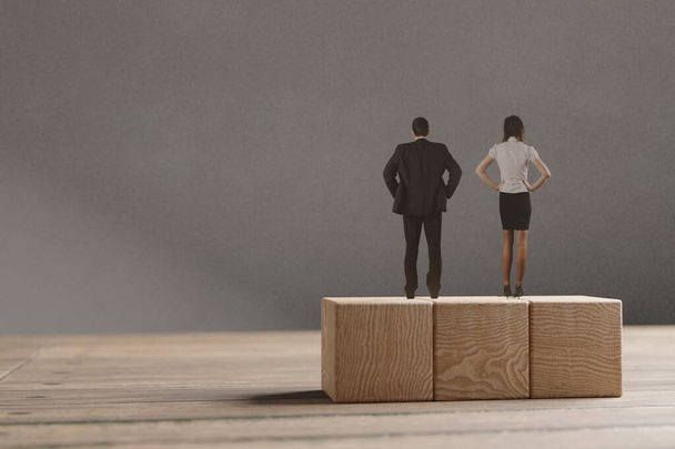 ミニチュアの男性と女性は、木製のブロックに立っている。男女平等の機会の概念. - 写真・画像