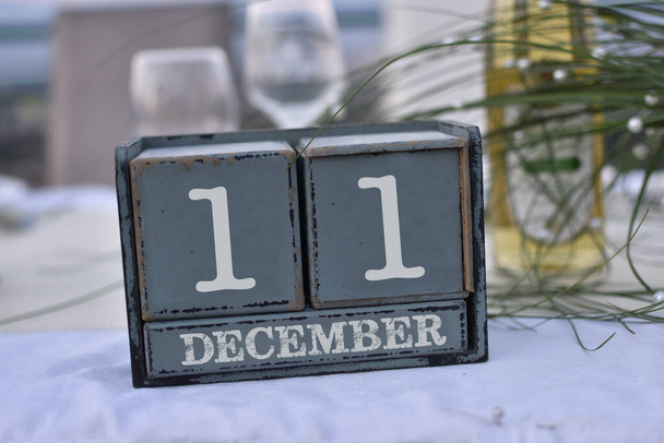 Wood blocks in box with date, day and month 11 December. Wooden blocks calendar - Photo, Image