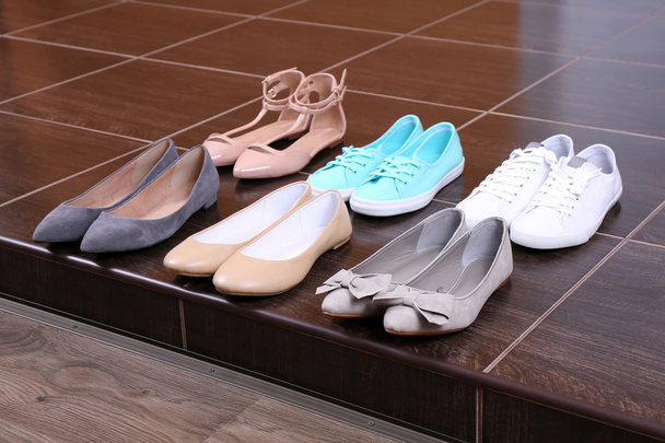 Different shoes on floor - Zdjęcie, obraz