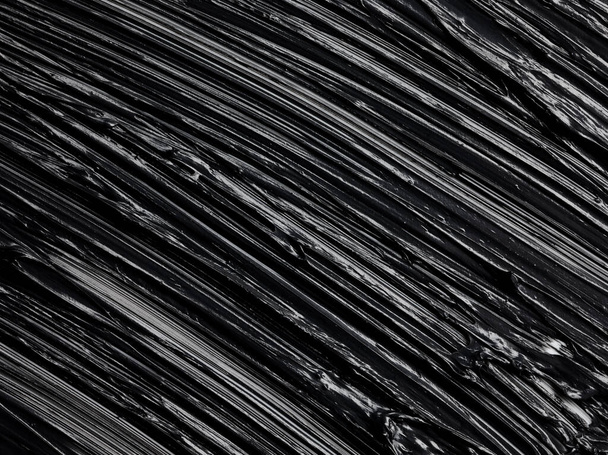 Μαύρο φόντο πινέλο μάσκαρα εγκεφαλικό επεισόδιο. Ακρυλική υφή χρώματος - Φωτογραφία, εικόνα