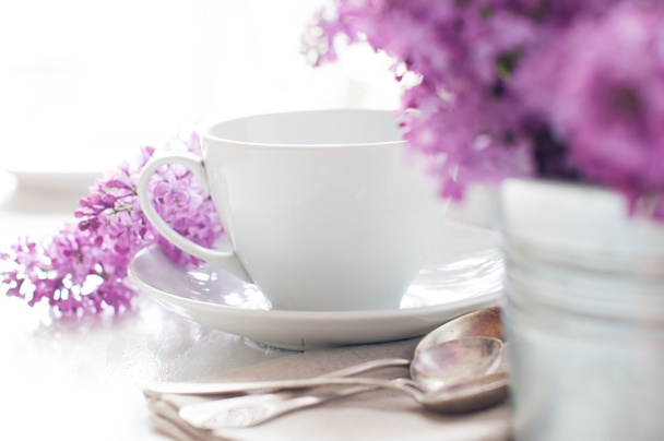 Delicate morning tea table setting - Foto, afbeelding