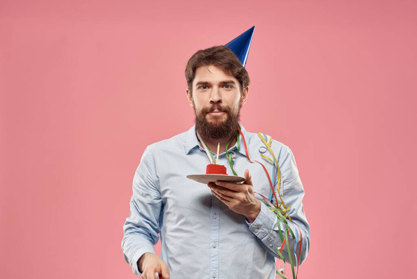 Man birthday party cake with candle cap fun - Foto, Bild