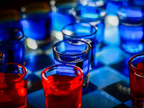 Chess board with shot glasses - Photo, Image