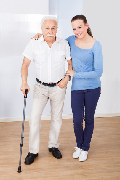 Caregiver With Senior Man - Фото, зображення
