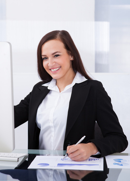Businesswoman Using Computer In Office - Photo, image