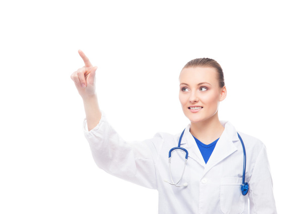 γιατρός γυναίκας που ωθεί ένα φανταστικό κουμπί - Φωτογραφία, εικόνα