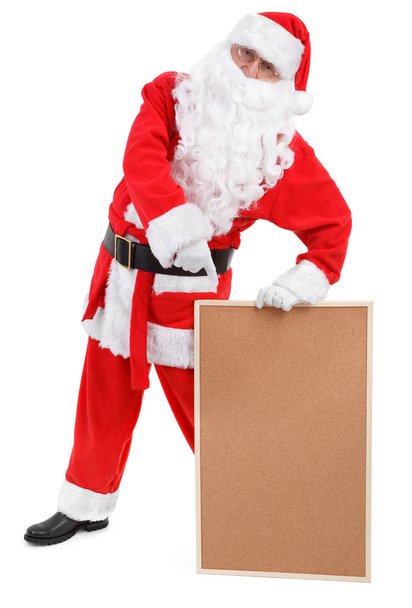 Santa claus shows empty bulletin board - Foto, afbeelding