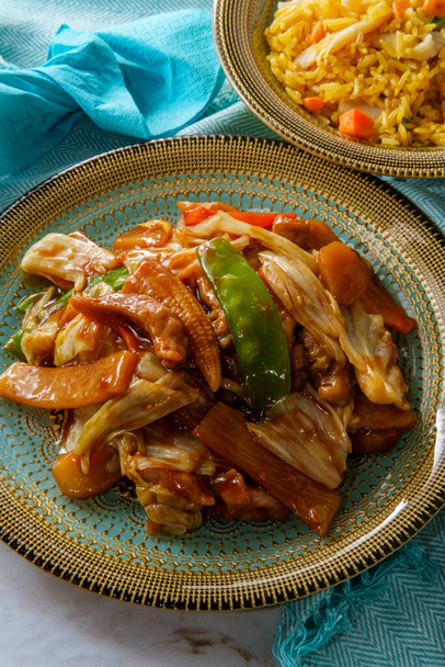 Chinese cuisine double cooked pork with cabbage and chicken fried rice - Photo, Image