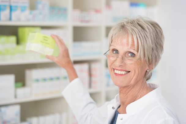 Smiling happy female pharmacist - Φωτογραφία, εικόνα