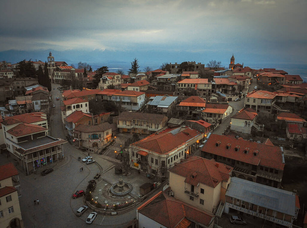 Love city Sighnaghi aerial view at dusk in overcast day. Travel destination Georgia - Photo, Image