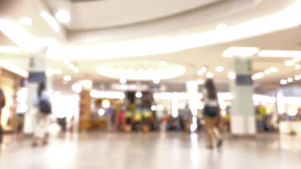 Αφηρημένη θολό φόντο σκηνή, Οι άνθρωποι ψώνια και το περπάτημα στο σύγχρονο κατάστημα πολυτελείας. Θολή Εσωτερικό του εμπορικού κέντρου αίθουσα με όμορφη bokeh για χρήση στο παρασκήνιο. - Πλάνα, βίντεο