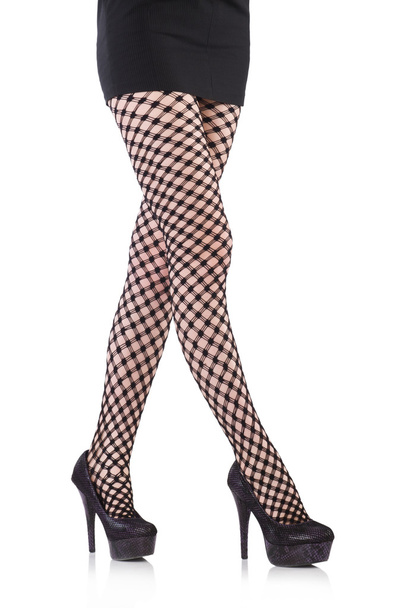 Woman in fishnet stockings - 写真・画像