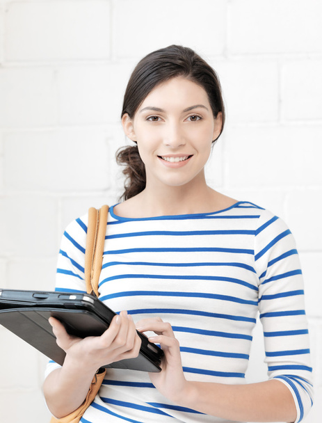 Happy teenage girl with tablet pc computer - Фото, изображение