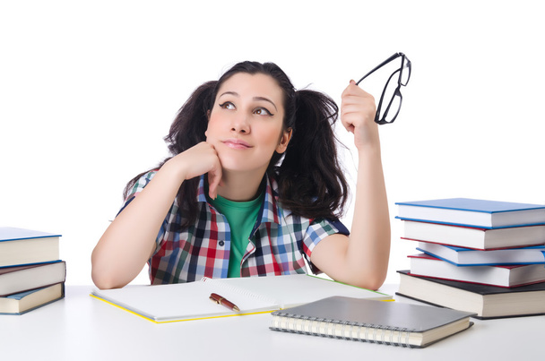 Estudiante cansado con libros de texto
 - Foto, imagen