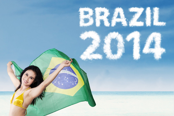 Brazilian fans holding Brazilian flag - Фото, зображення