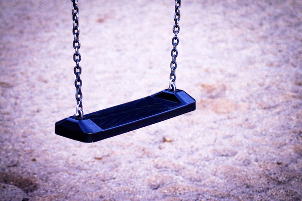 Wooden swing with metal chains for children. No people - Photo, Image