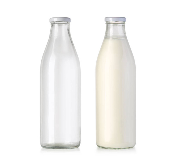  glass milk bottles isolated on white with clipping path - Photo, Image