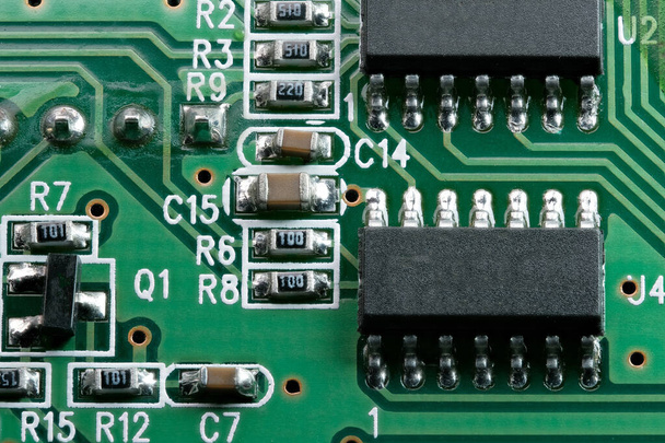 Fragment of electronic microcircuit of modern digital equipment close-up macro photography - Photo, Image
