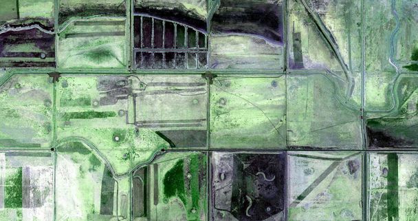    United States, abstract photography of relief drawings in  fields in the U.S.A. from the air, Genre: Abstract Naturalism, from the abstract to the figurative,  - Photo, Image