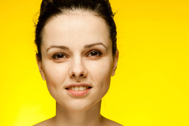 brunette with bare shoulders yellow fashion glasses emotions - Photo, Image