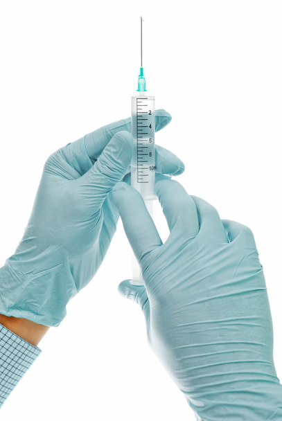 Medical doctor with syringe in hands. - Фото, зображення