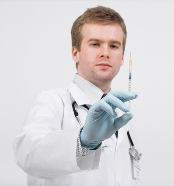 Doctor with syringe - Foto, Bild
