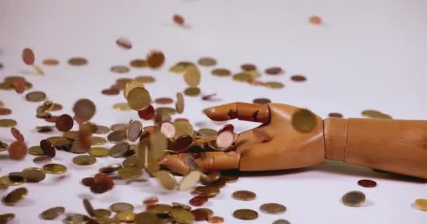 Coins falling on an outstretched hand in slow motion - Footage, Video