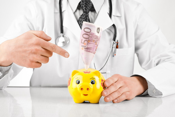 Doctor with euro banknote - Zdjęcie, obraz