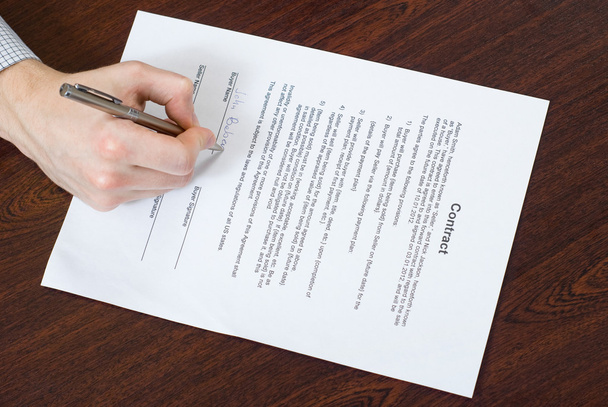 Signing contract by businessman - Photo, Image