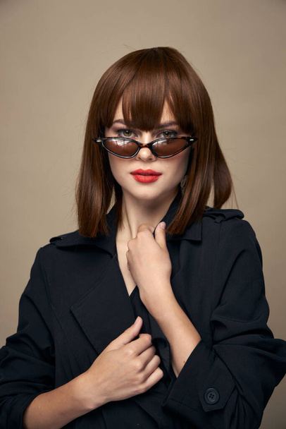 Fashionable woman Model portrait black coat makeup dark glasses - Zdjęcie, obraz