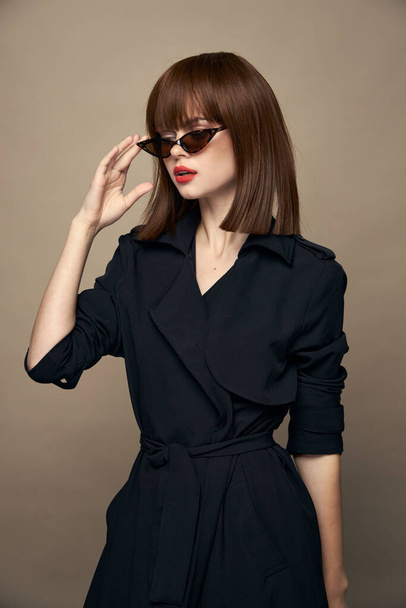 Brunette Fashionable glasses on the face red lips  - Photo, Image