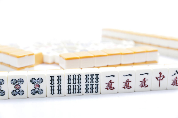 Mahjong game on white table, close up. - Photo, Image