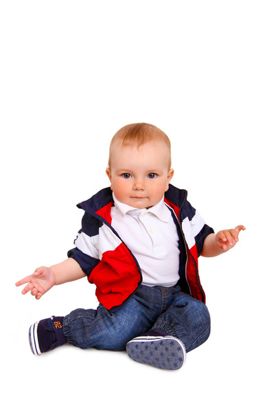 Little boy sitting isolated on  white background - Foto, afbeelding