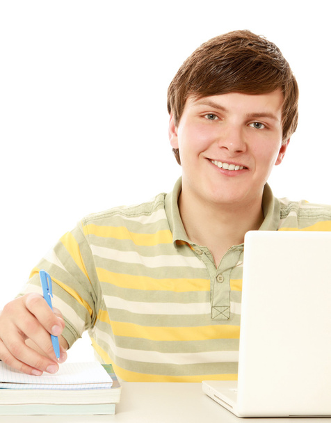Guy in front of a laptop studying - Φωτογραφία, εικόνα