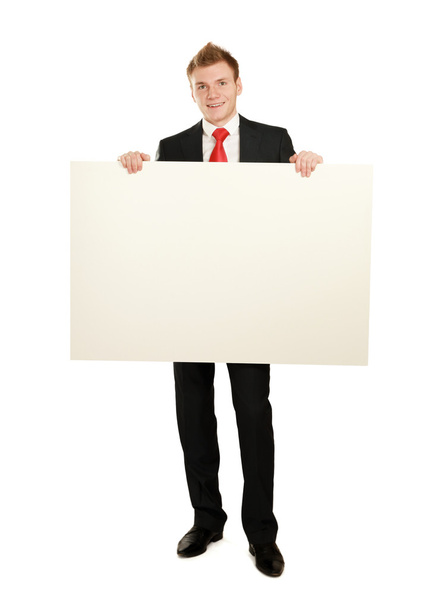 A business man with an empty blank - Фото, зображення