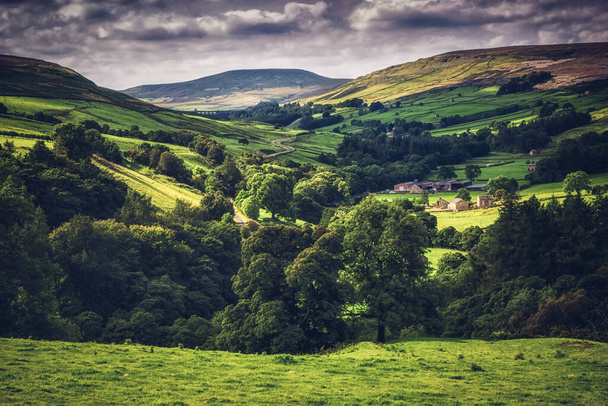 green hills with a cloudy sky - Photo, Image