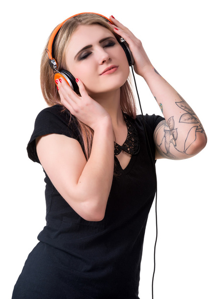 Smiling young girl in headphones - Foto, imagen