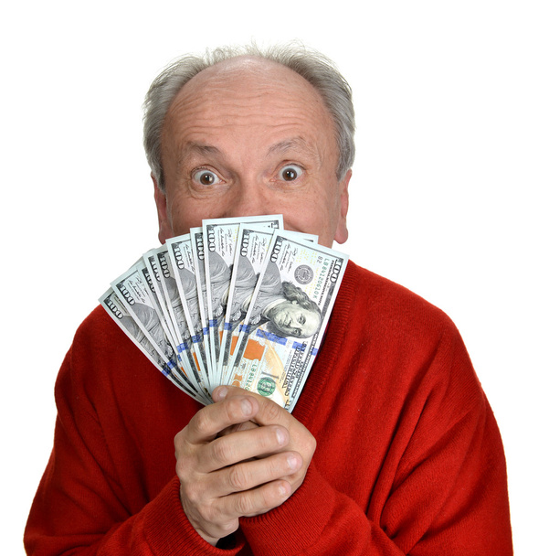 Onnellinen iäkäs mies pitää dollarin seteleitä
 - Valokuva, kuva