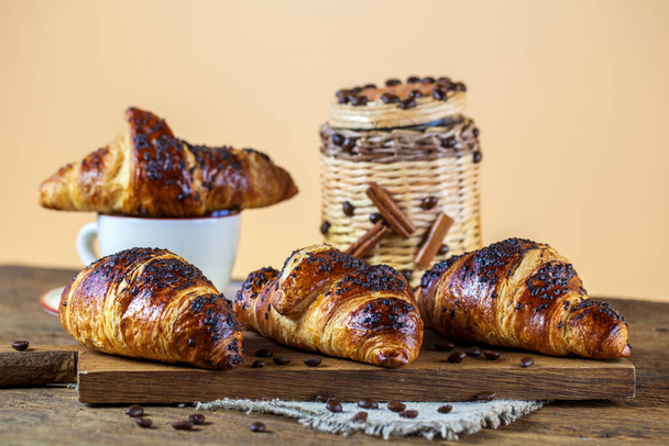 French croissants on a wooden background - Photo, Image
