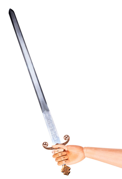Medieval sword isolated in wooden hand - Φωτογραφία, εικόνα