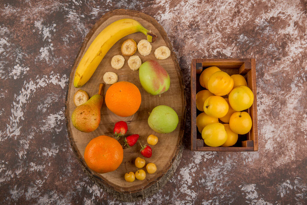 copy space concept with fresh fruits on marble background - Foto, Bild