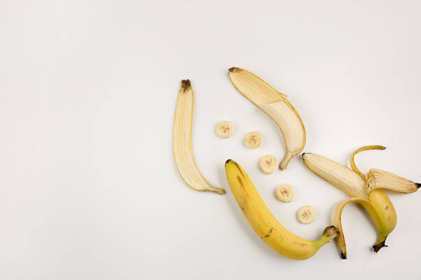 yellow bananas isolated  on background, close up - Photo, Image