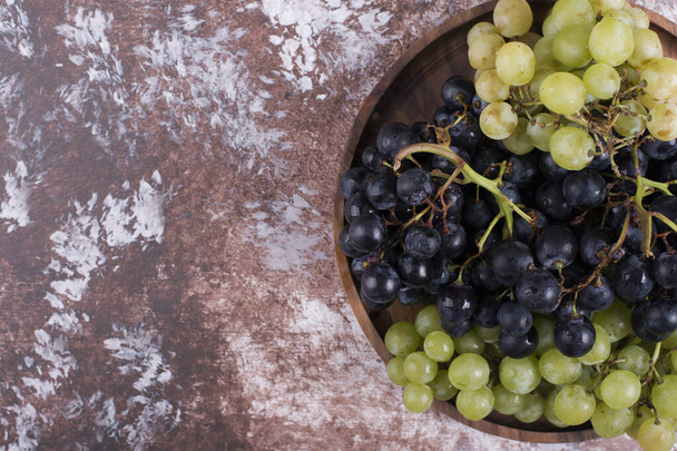 fresh grapes in bowl on table background. - Photo, Image