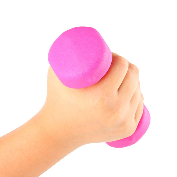 Pink Dumbbell in child hand  - Фото, изображение