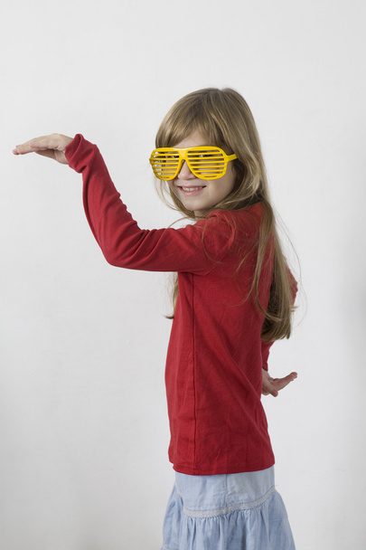 Girl in yellow sun glasses - Photo, image