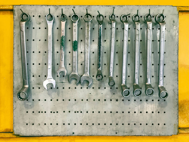 combination wrenches on wall in garage - 写真・画像