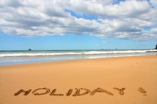 Hot Water Beach in Coromandel peninsula. New Zealand - North Island. Holiday - stick written text. - Fotografie, Obrázek