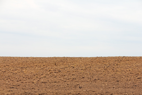 Dry plowed earth agricultural land - Φωτογραφία, εικόνα